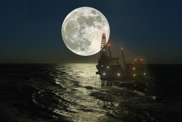 Oil rig at midnight