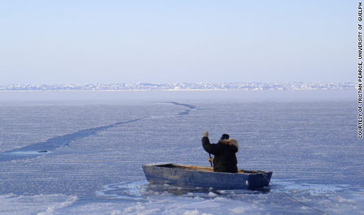 Inuit sailing in arctic waters