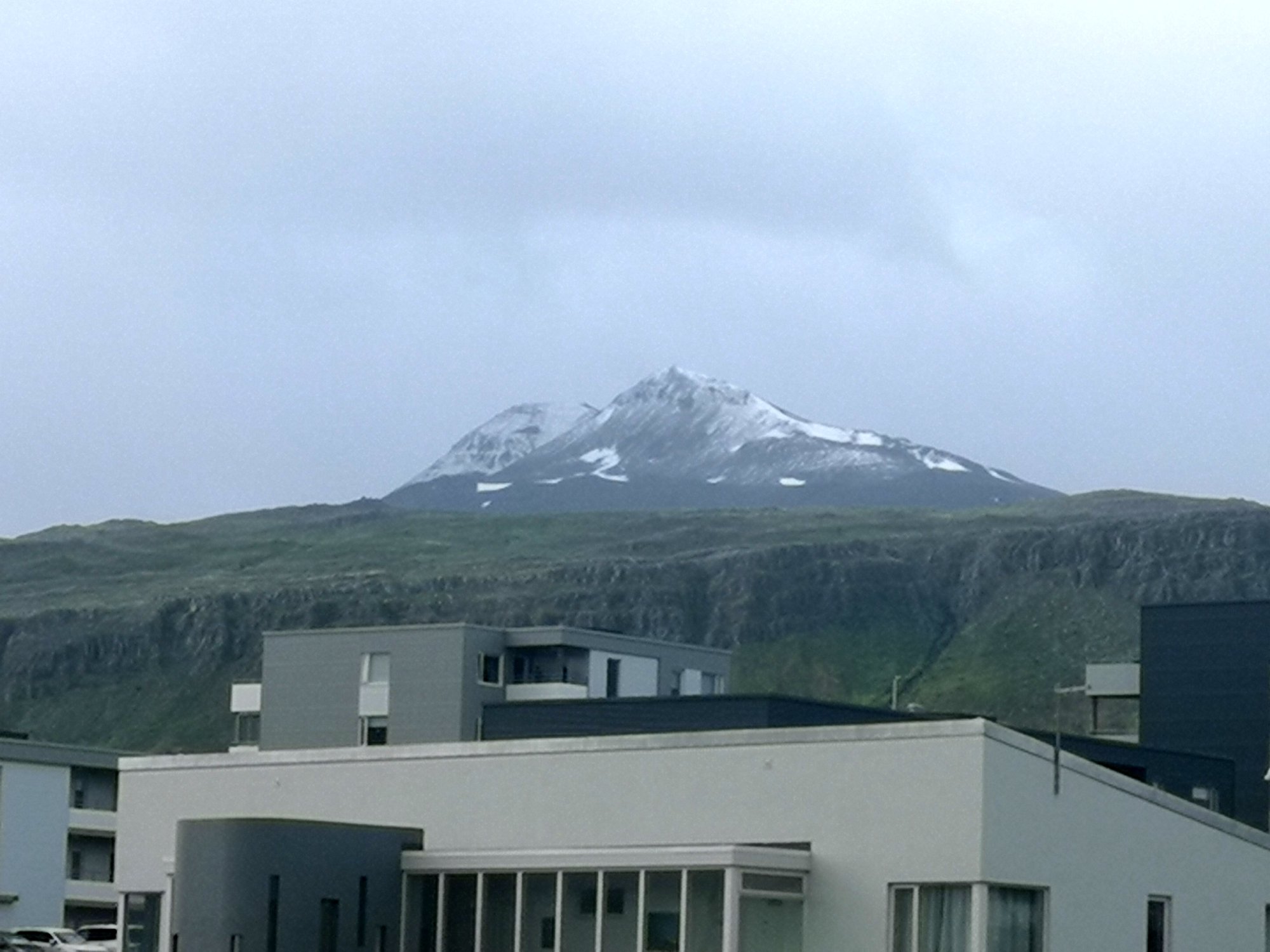 Akureyri in July - Snowy Mountains